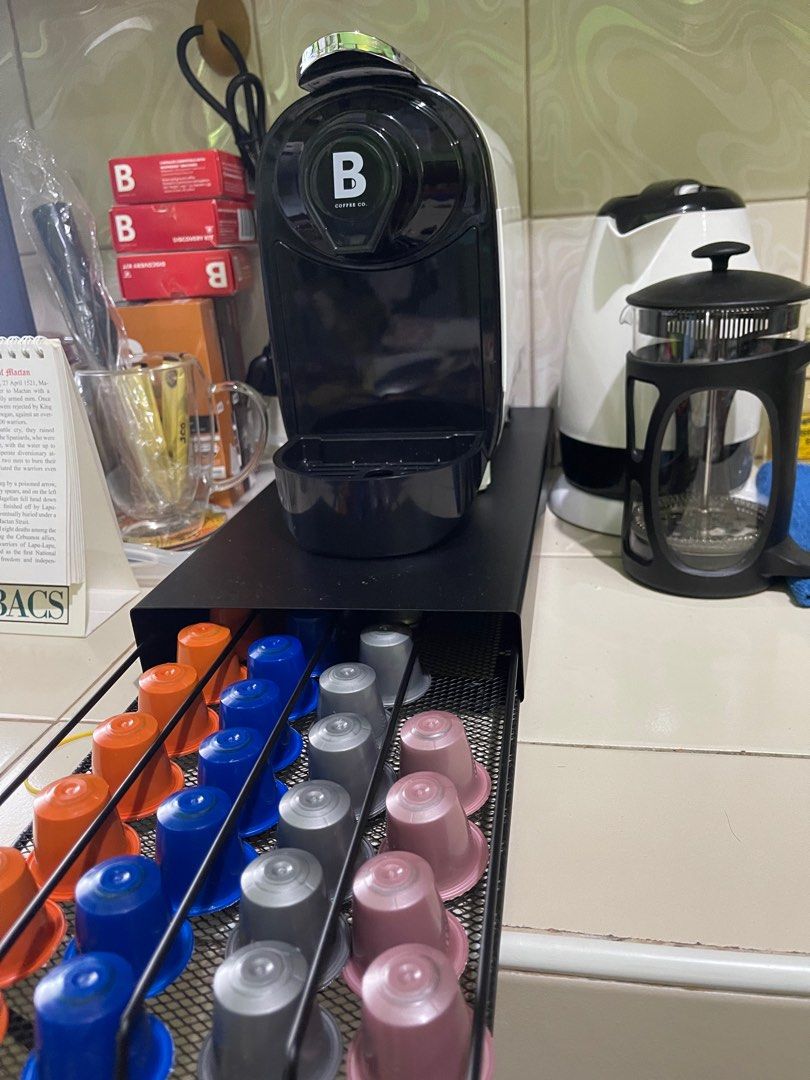 B Coffee Machine (Category: Coffee Machines & Makers) located in Manila. Submitted by zaristoreph (Listing ID 1313955598, Image 2). Description: Original B coffee Machine Color: White and Black Condition: Excellent, complete with Box Freebies: 1. Heavy duty Pods Metal Tray / Container 2. coffee press Note: Coffee pods not included. but it's available in leading super markets / groceries RFS: Apparently I have 2 machines. I bought 1 and got this a