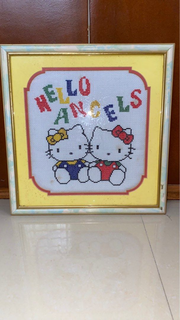 Hello Kitty Cross-stitch (Category: Frames & Pictures) located in Cavite. Submitted by eessaa08 (Listing ID 1313859170, Image 1). Description: Hello Kitty Cross-stitch with frame Issue: needs cleaning inside for borders, with stain in Cross-stitch cloth, Dimension: 15.6” x 16” RFS: Decluttering MOP: GCash MOD: Lalamove only (buyer to pay for shipping fee).