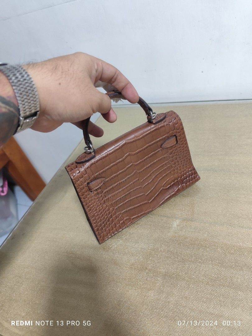 Hermes (Category: Luxury Bags & Wallets) located in Navotas City. Submitted by mistej (Listing ID 1313951564, Image 3). Description: hermes mini crock 2way bag no sling japan thrifted in good use condition.