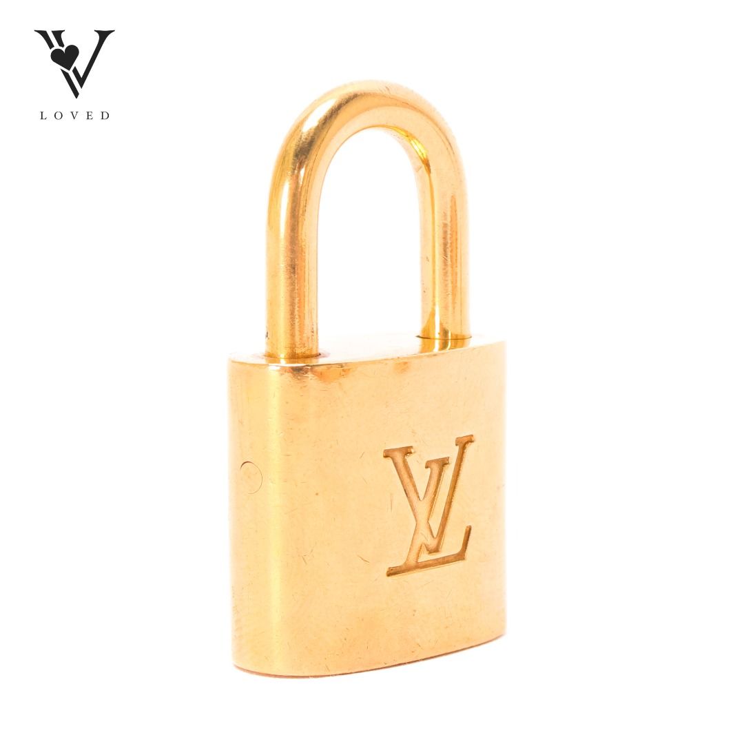 Louis Vuitton Locks And Keys (Category: Other Accessories) located in San Pablo. Submitted by vloved.ph (Listing ID 1313795002, Image 3). Description: Condition: VERY GOOD Notes: The item displays general signs of use, indicating a history of previous use. This adds a unique character to the piece, showcasing its enduring appeal..