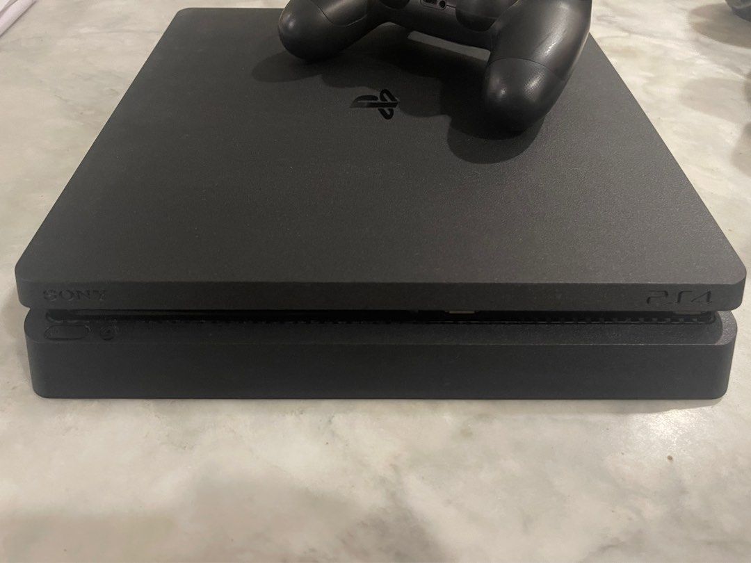 original ps4 slim bundle (Category: PlayStation) located in Quezon City. Submitted by _qqq23 (Listing ID 1313931423, Image 2). Description: ps4 slim 500gb FIRST OWNED. bought from data blitz inclusive of: original ps4 console 1 original black controller original box (no dents) original hdmi cable original power cable all of the games in the picture no issue. no scratches. no dents. nothing was replaced. not jailbreak. never dropped. how i bought 