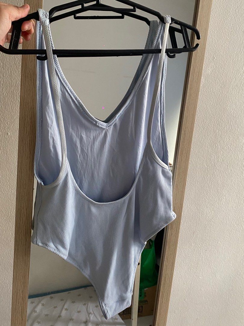 Poweder blue TOPSHOP One-piece (Category: Bikinis & Swimsuits) located in Quezon City. Submitted by oncewasmytype (Listing ID 1313879119, Image 2). Description: Can fit to S-M No pad slot A little bit yellowish yung strap pero hindi halata ang super ganda padin. Used once. Note: Purple dot sira ng camera ko po..