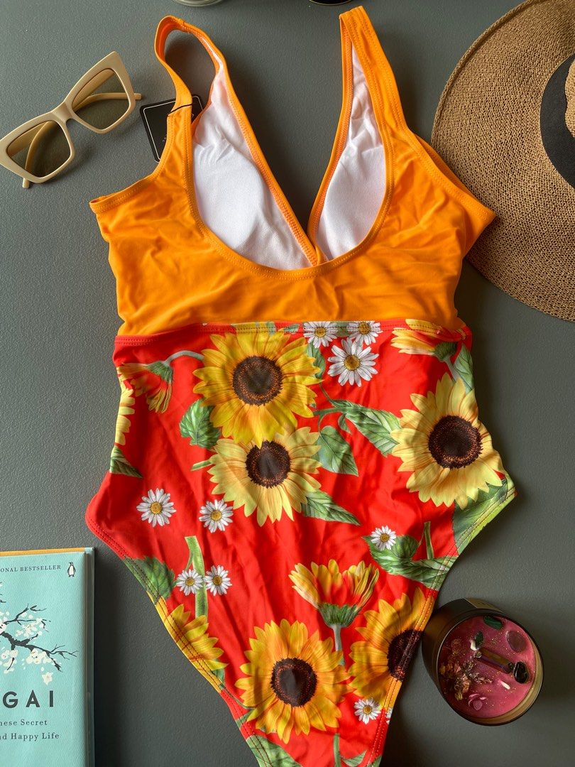 Red and Orange sunflower bikini one piece (Category: Bikinis & Swimsuits) located in Manila. Submitted by avery._ (Listing ID 1313889660, Image 3). Description: Zaful Brand Size Medium Rfs wrong size.