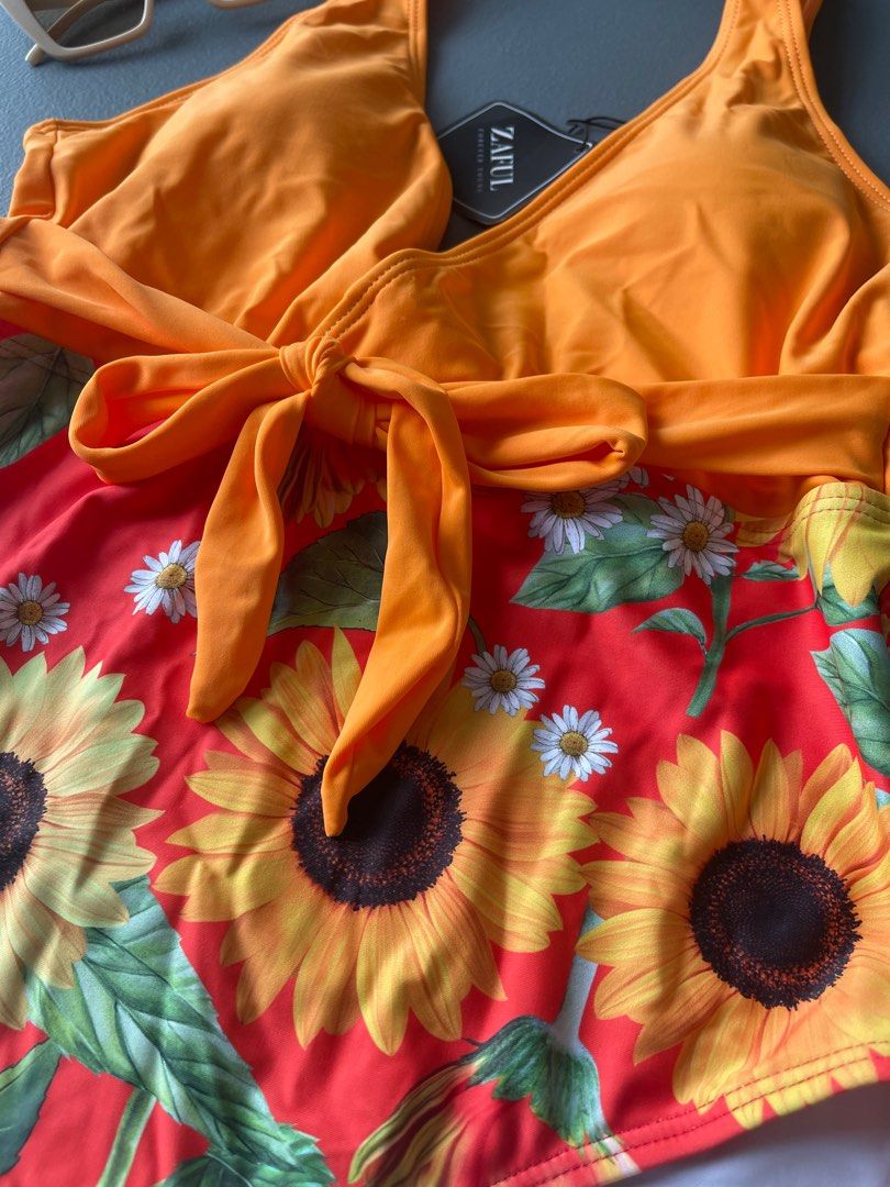 Red and Orange sunflower bikini one piece (Category: Bikinis & Swimsuits) located in Manila. Submitted by avery._ (Listing ID 1313889660, Image 2). Description: Zaful Brand Size Medium Rfs wrong size.