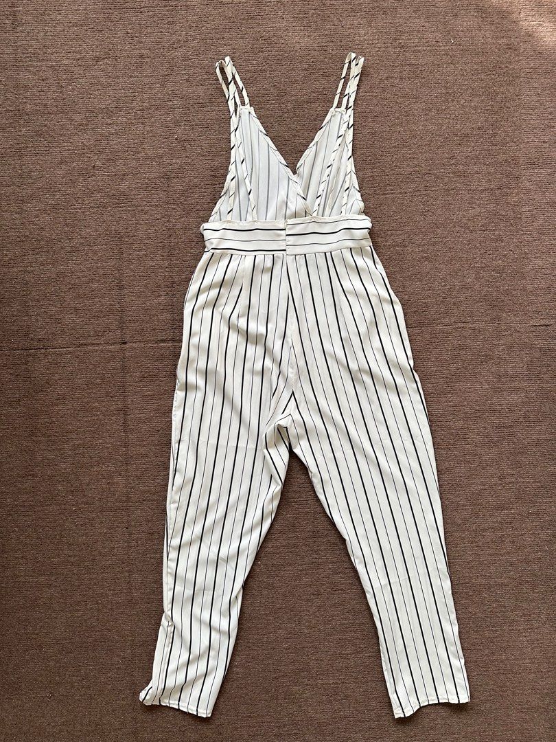 White Pinstripes Jumpsuit (Category: Jumpsuits) located in Quezon City. Submitted by declutteringbybones (Listing ID 1313799669, Image 2). Description: Unbranded white pinstripe jumpsuit Visible side boob, backless Size: XS RFS: decluttering, not my style, used once.