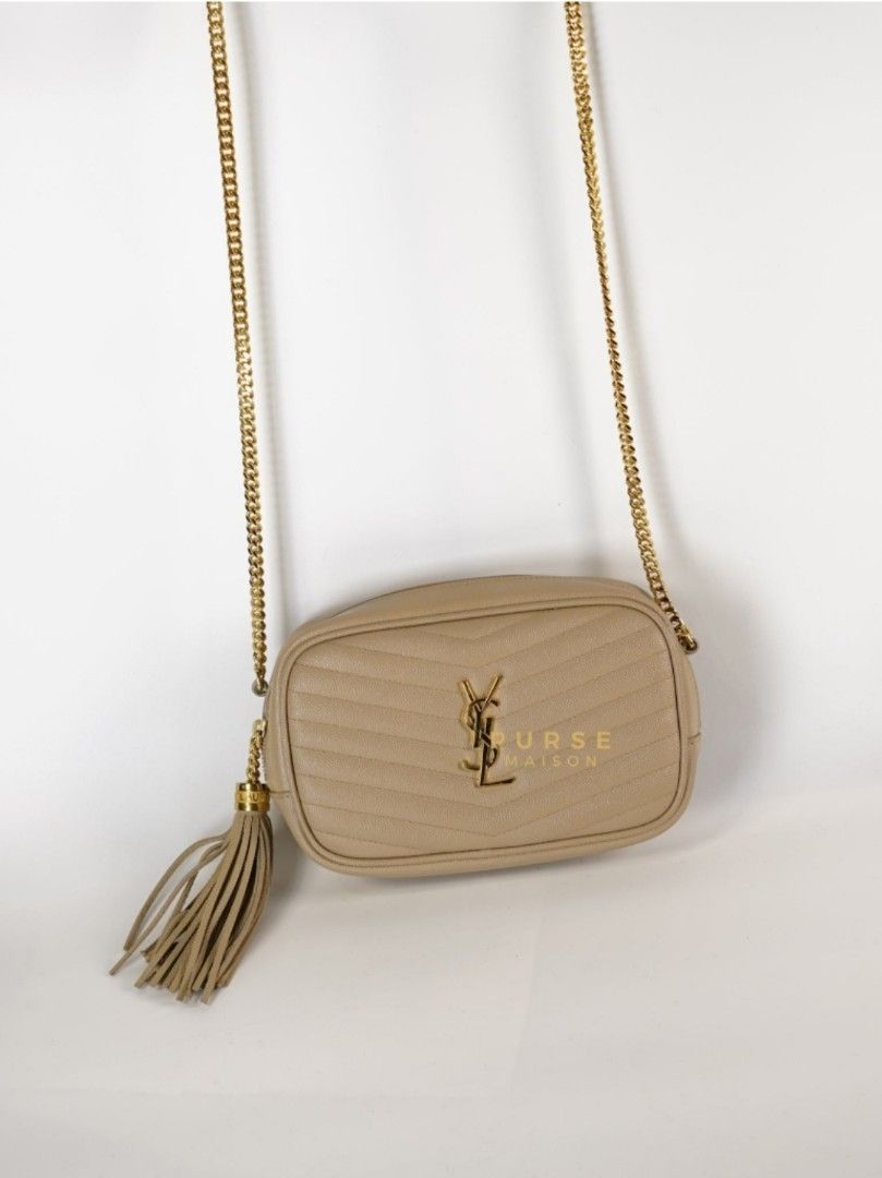 YSL Lou Mini Beige Chain Bag Gold Hardware (Category: Luxury Bags & Wallets) located in Taguig. Submitted by pursemaison (Listing ID 1313830332, Image 1). Description: YSL Lou Mini Beige Chain Bag Gold Hardware ✨Php 69,500 *Additional 3.85% for straight credit card payments *Available for 4 months layaway with 1% interest per month *BDO credit card up to 36 mos & Citibank credit card up to 24 mos (with interest) CONDITION: Excellent condition wit