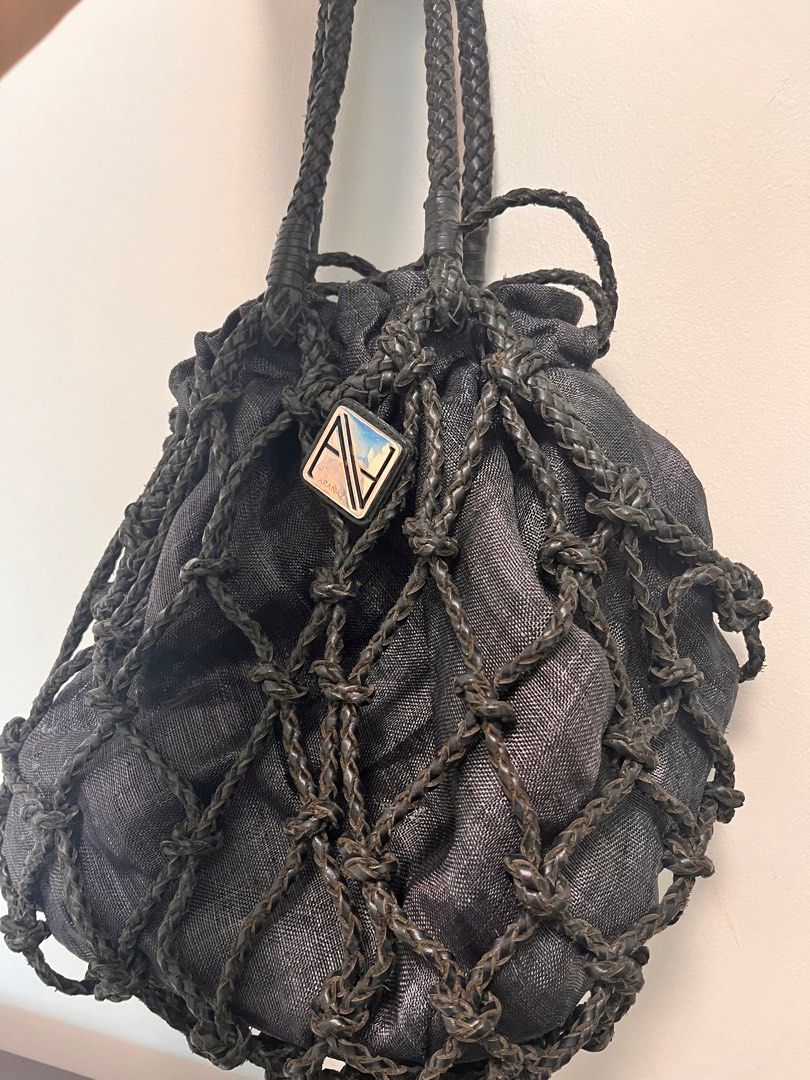 Aranaz black leather +linen purse medium size (Category: Purses & Pouches) located in Makati City. Submitted by loveeph (Listing ID 1314062418, Image 2). Description: Aranaz purse, with leather handle Medium size, can be used from day to evening, or as a beach bag Height 9" x Length 10 to 13" depending if stretched Used several times but linen and leather combo looks good 1st photo FOR REFERENCE ONLY .