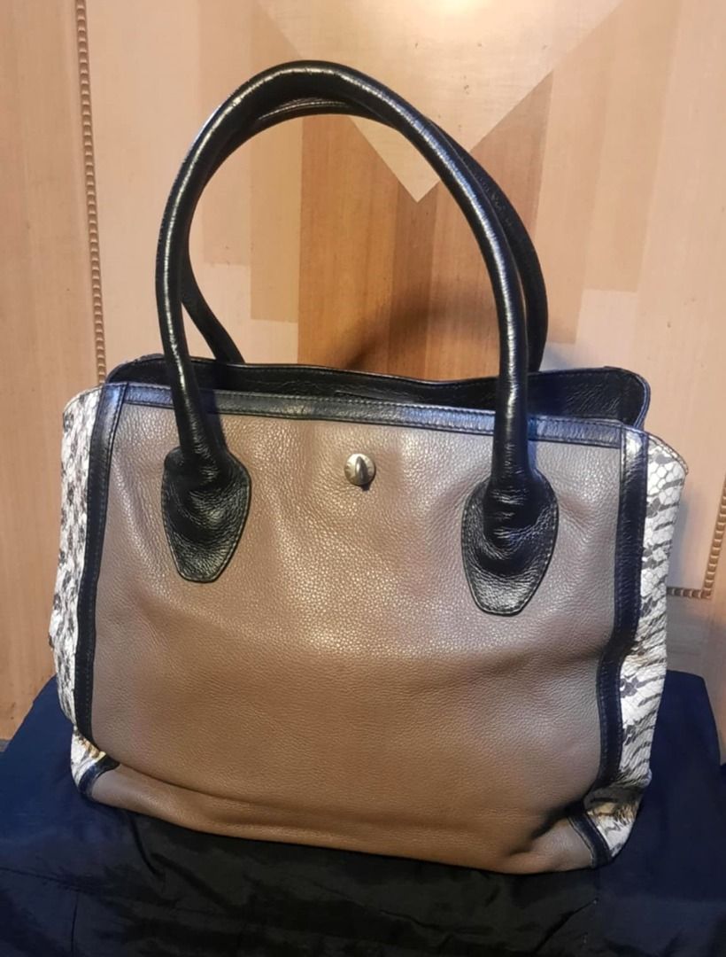 PAYDAY SALE! Furla Bag(Authentic) (Category: Luxury Bags & Wallets) located in Cebu City. Submitted by nbetcuban007trendyfinds (Listing ID 1314103446, Image 1). Description: Furla Authentic large hobo beige black n white. Slightly used. Great for any occasion Issue: missing metal accessories (see the last foto ) Shipping is FREE if you buy two or more items from my shop. Disclaimer: TrendyFinds 2.0 is not associated or affiliated with any brands 