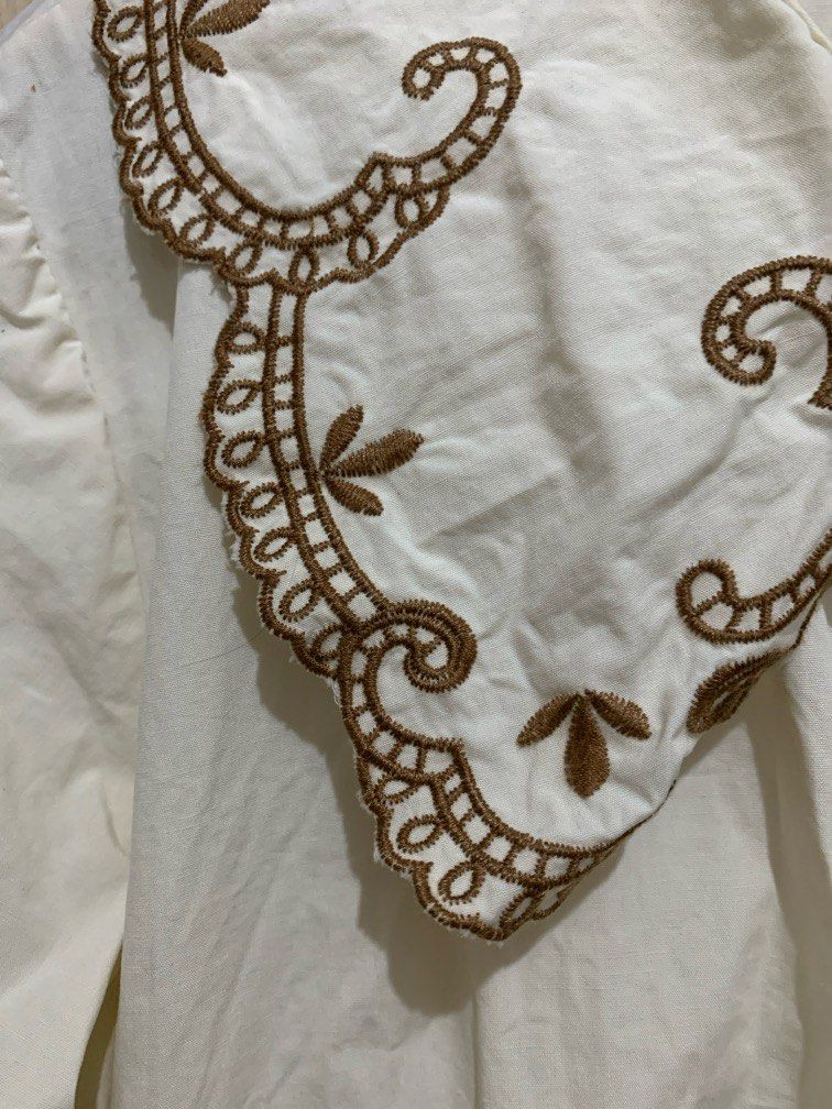 Babydoll Blouse with detailed collar (Category: Blouses) located in Quezon City. Submitted by caspii (Listing ID 1314073639, Image 2). Description: Babydoll blouse with detailed collar The main color is beige with brown lace-ish details I love the collar style!! Fits M-L, can also fit S but oversized MOP: Gcash/Maya Loc: Welcome Rotonda, QC.