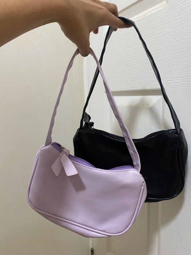 Baguette bag (Category: Backpacks) located in Cavite. Submitted by _cc25 (Listing ID 1314152688, Image 1). Description: Bought these two for around 250-300 pesos each. Selling low, 150 pesos take all. Rfs: decluttering .
