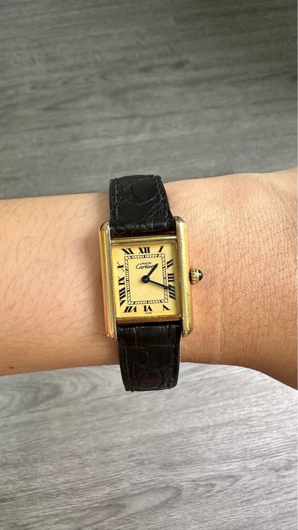 Cartier Tank (Category: Luxury Watches) located in Manila. Submitted by hola.koala (Listing ID 1314018041, Image 1). Description: Must De Cartier Tank Classic Roman Ivory Dial Case: Vermeil Argent 925 21mm x 28mm case size Original Cartier Deployant Original strap Quartz movement Newly serviced box and manual.