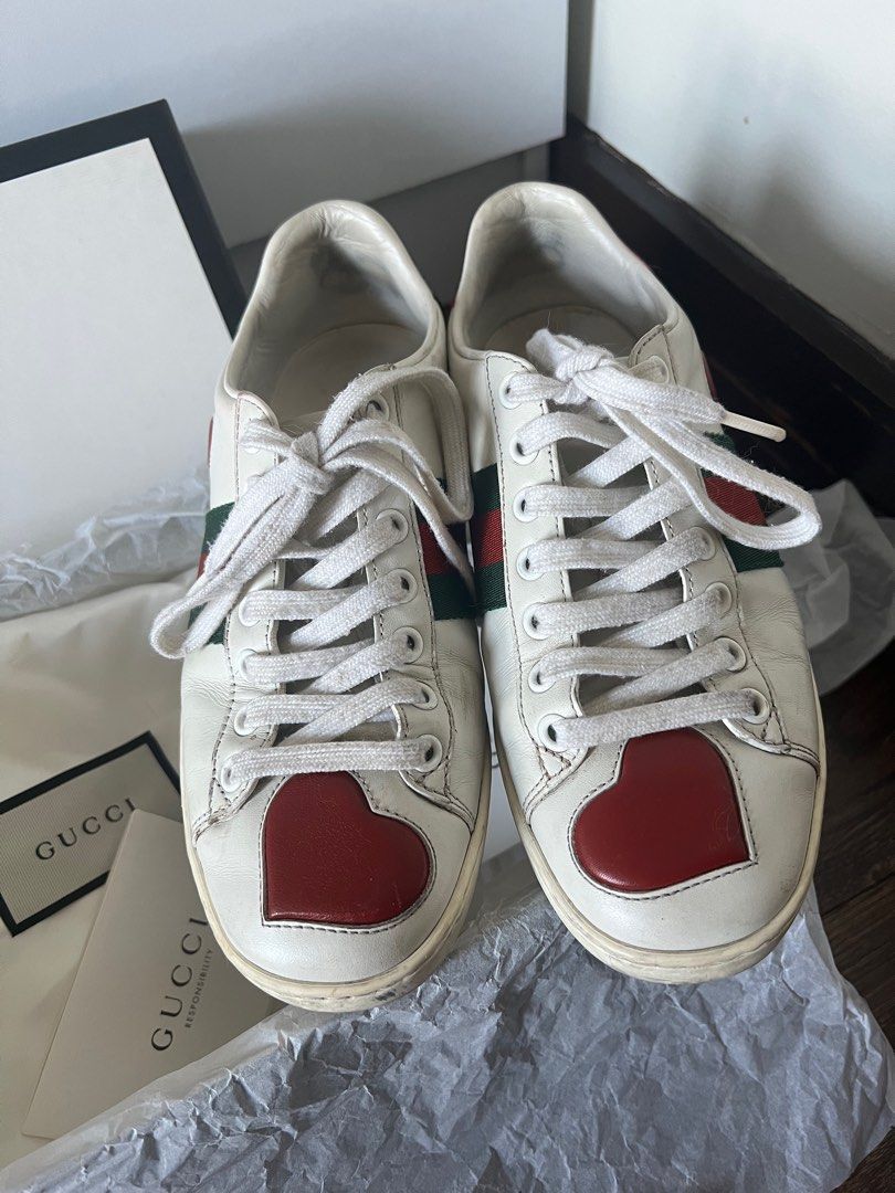GUCCI ACE SNEAKERS HEART AUTHENTIC (Category: Sneakers & Footwear) located in Manila. Submitted by tk.preloved (Listing ID 1314086737, Image 2). Description: Gucci ace sneakers with red heart ❤️ AUTHENTIC 💯 Bought this in HK Size 35 (runs big) fit up to size 7 (im size 7) With dustbag, card and box No sira or anything. Just dirt Need cleaning nalang. But all good 🥰 Pm for sure buyer!!! Rfs: dna ngagamit .