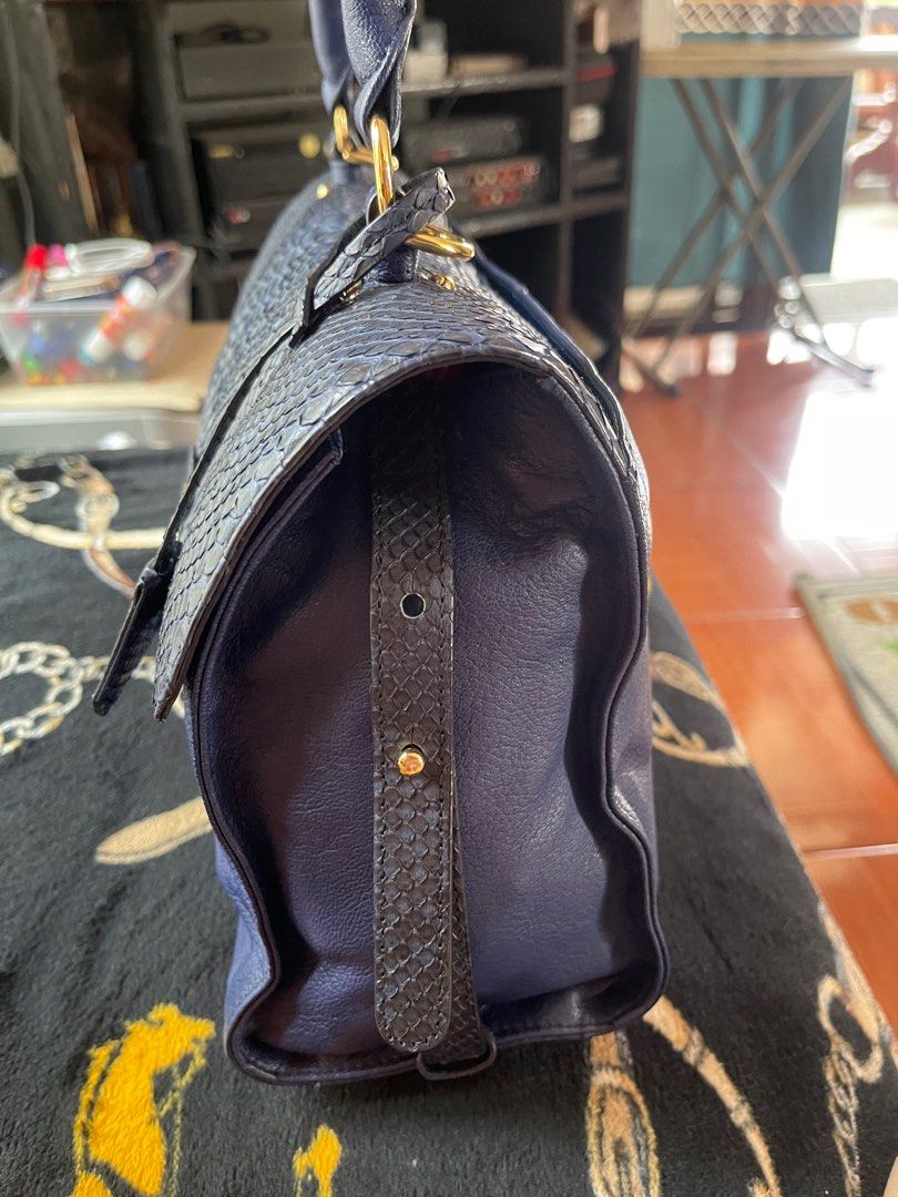 JEAN LOUIS SCHERRER BAG (Category: Luxury Bags & Wallets) located in Rizal. Submitted by preloved1143 (Listing ID 1314005708, Image 3). Description: JLS Phyton Bag Royal Blue Authentic Snake Leather No flaws Like New Can be worn in multiple ways Comes with shoulder, sling leather strap.