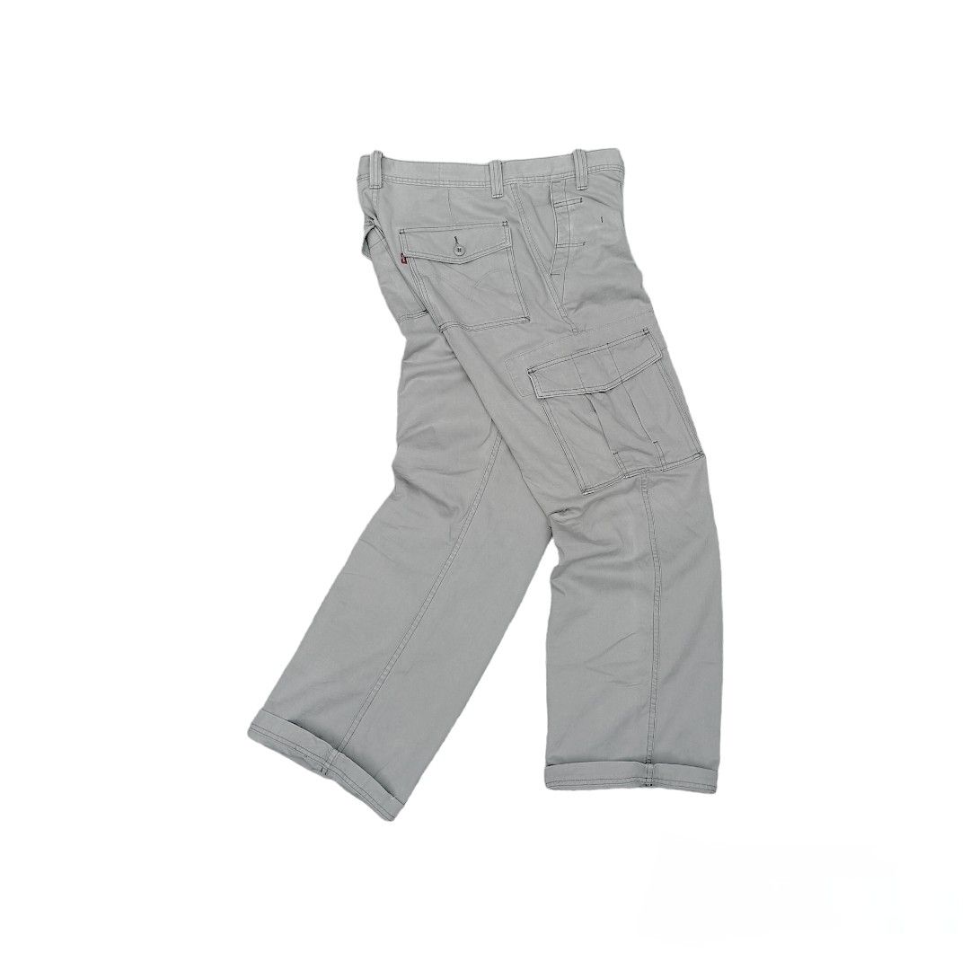Levi's workwear cargo baggy pants (Category: Jeans) located in Balanga. Submitted by faded_garmz (Listing ID 1314082712, Image 1). Description: Levi's workwear cargo baggy pants Available Condition: Excellent Waist: 34" Length: 39" Leg opening: 10.5" Issue: none Color may vary due to lighting.