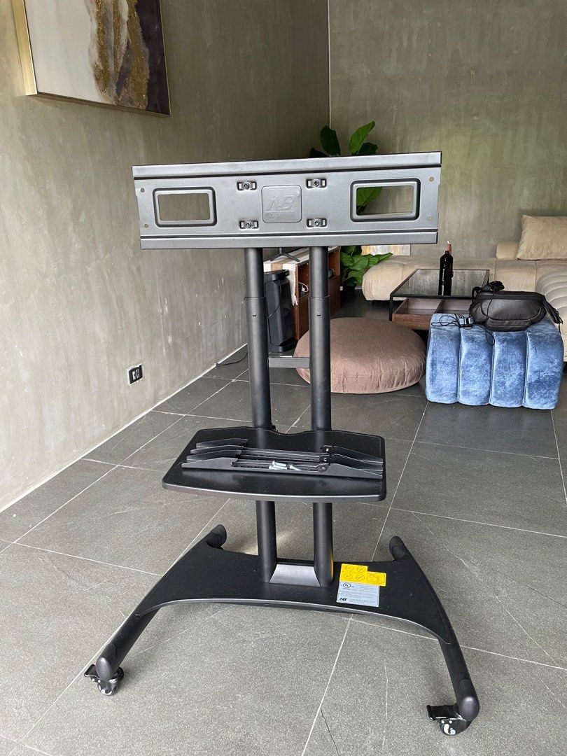 Movable Tv Bracket (Category: TV Parts & Accessories) located in Magallanes. Submitted by declutteriiiiiing (Listing ID 1314120663, Image 2). Description: Original North Bayou Movable Tv Bracket 💯 Like New (Di rin nagamit kasi di bagay sa house) pwede sya sa mga naka condo or with small scapes living area. Orig price: 7k Can fit 32”-75” tv Pickup only .