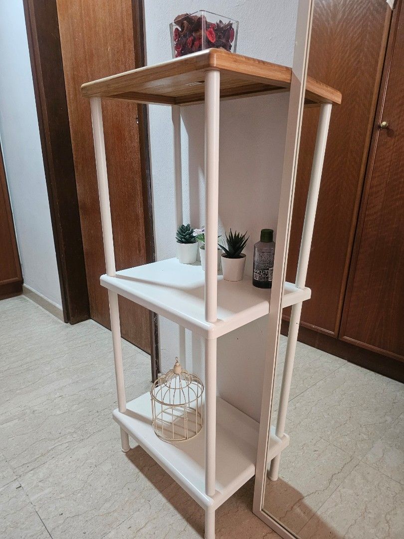 Multi level Shelf (Category: Storage Boxes & Baskets) located in Singapore. Submitted by itsvinz (Listing ID 1314030243, Image 1). Description: Like new - no damage, clean and well maintained. Products on shelf for display only. Height - 95 cm/ 37in Width- 40 cm/ 15in Depth from wall - 25 cm/ 10in Self pick up from 079903..