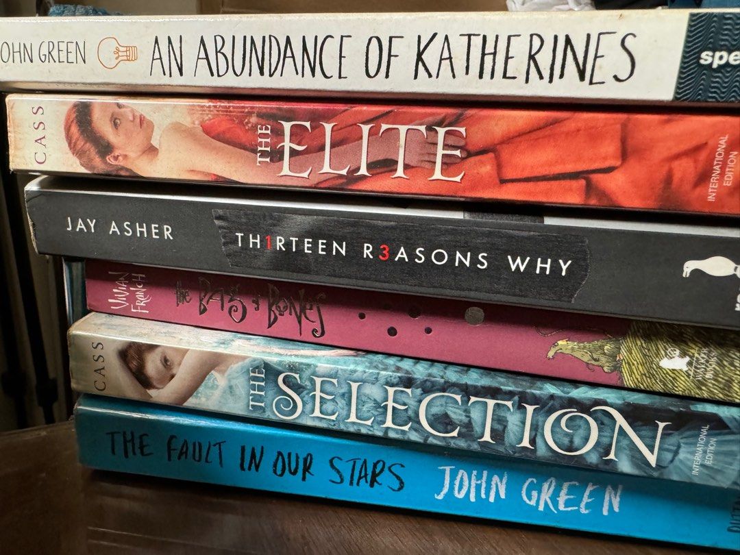 pre-loved books (decluttering sale ‼️) (Category: Storybooks) located in Manila. Submitted by aye.nah (Listing ID 1314079673, Image 1). Description: ᝰ random books an abudance of katherines by john green the selection by kiera cass — ❌ SOLD the elite by kiera cass — ❌ SOLD the bag of bones by vivian french thirteen reasons why by jay asher the fault in our stars by john green — ❌ SOLD — ₱50 to ₱100 (PRICE RANGE EACH) TAKE ALL FOR ₱200 only • has 