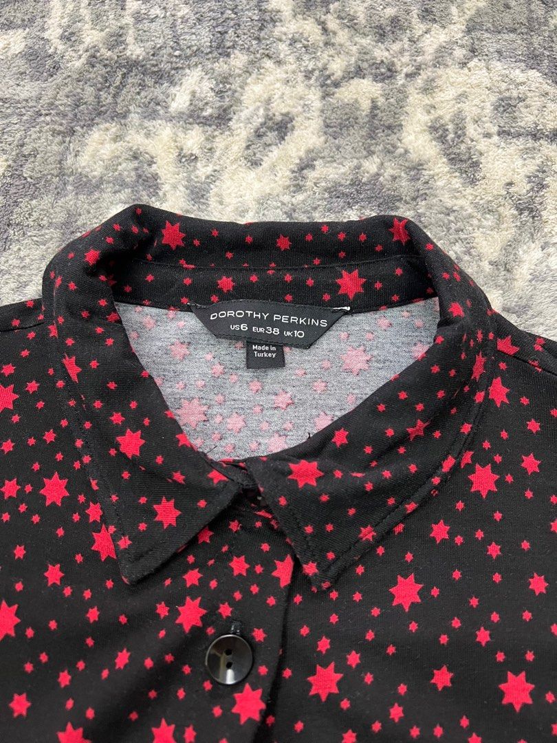 Printed dress with belt (Category: Dresses) located in Pasay City. Submitted by netuy (Listing ID 1313990949, Image 3). Description: Printed short dress with buttons. Black with red stars. Comes with matching belt. 3/4 sleeves. Very comfy and soft cotton fabric. Can fit s/m. .