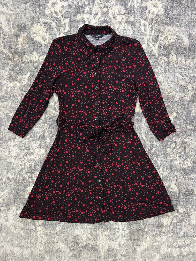 Printed dress with belt (Category: Dresses) located in Pasay City. Submitted by netuy (Listing ID 1313990949, Image 2). Description: Printed short dress with buttons. Black with red stars. Comes with matching belt. 3/4 sleeves. Very comfy and soft cotton fabric. Can fit s/m. .