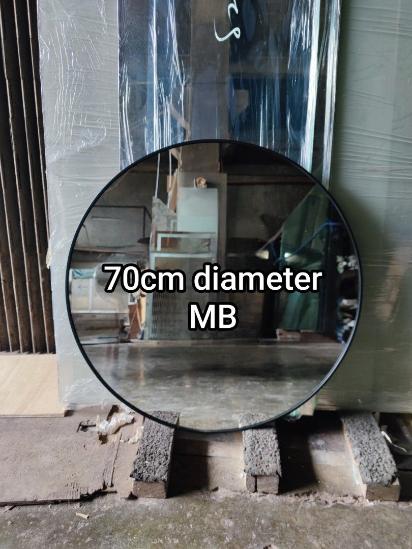 Round mirror with matte black aluminum frame (Category: Mirrors) located in Malabon City. Submitted by mirrors.ph (Listing ID 1313978492, Image 1). Description: Round mirror with matte black aluminum frame and plywood backing using 6mm thick copper free mirror. Size: 70cm diameter P1687.50 Add P100 if with back hook. Available colors gold, black, matte black, white and silver aluminum frame. Customize sizes and shapes are welcome..