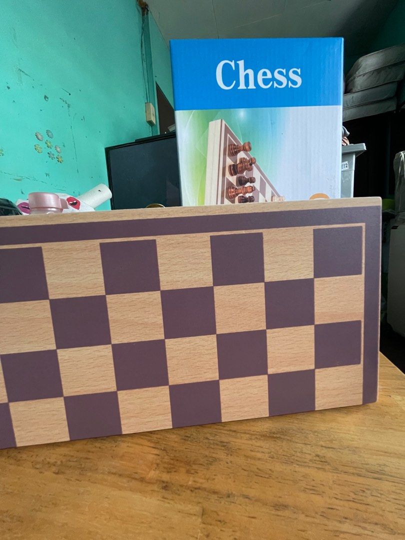 Wooden Chess Board 29x29cm (Category: Board Games & Puzzles) located in Pasig City. Submitted by shinzoned (Listing ID 1314013877, Image 2). Description: Brand New Travel Sized Chessboard Pasig loc Can Pick up Today 2pcs available Gcash Payment.
