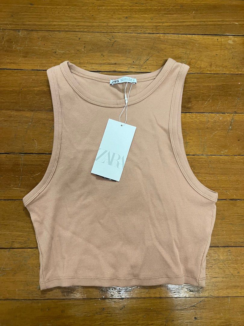 ZARA racerback top (Category: Sleeveless) located in Quezon City. Submitted by shandre10 (Listing ID 1314145651, Image 1). Description: RFS: bought the wrong size.