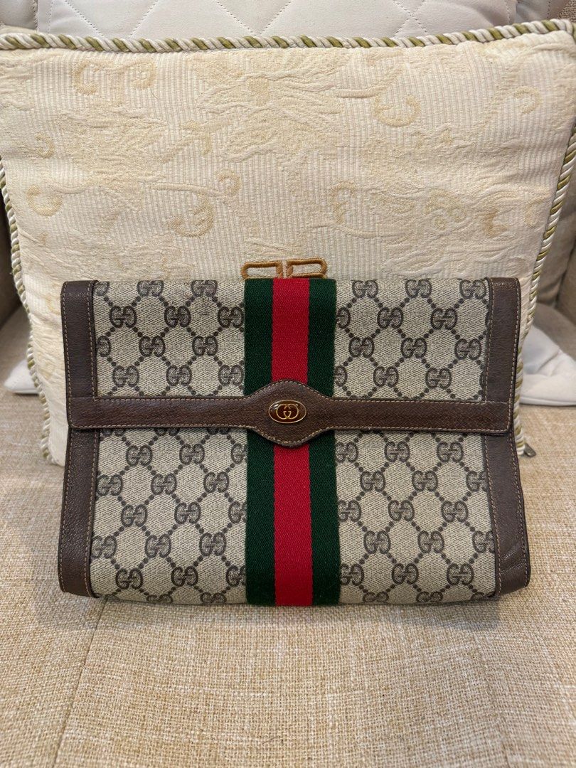 Authentic Gucci GG Supreme Clutch bag