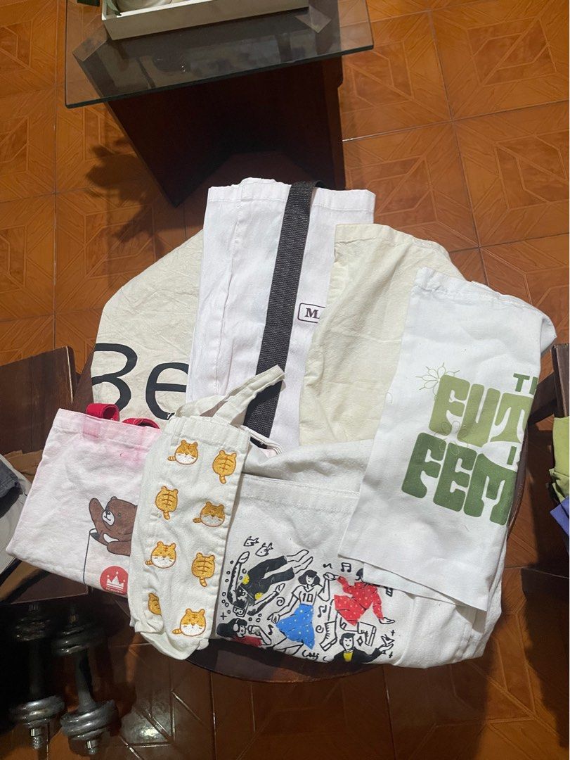 [BUNDLE] Assorted Tote Bags (Category: Tote Bags) located in Caloocan City. Submitted by n0thingshere (Listing ID 1314265403, Image 1). Description: Bundle includes: Bershka Tote Bag Marketplace Grocery Bag Uniqlo Tote Bag (medium) Gene Plus Jas Water Bottle Bag Uniqlo 10th Anniversary Tote Bag The Future is Female Customized Tote Bag Macao Imperial Tote Bag (free) No tingi, bundle only Price is firm .