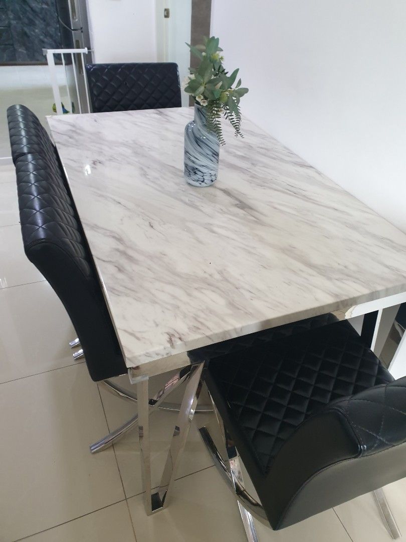 Dining Table Set (Category: Tables & Sets) located in Singapore. Submitted by mightus (Listing ID 1314170361, Image 1). Description: To sell dining table and 4 chairs. has a slight chip as shown on the picture. rfs, moving out..