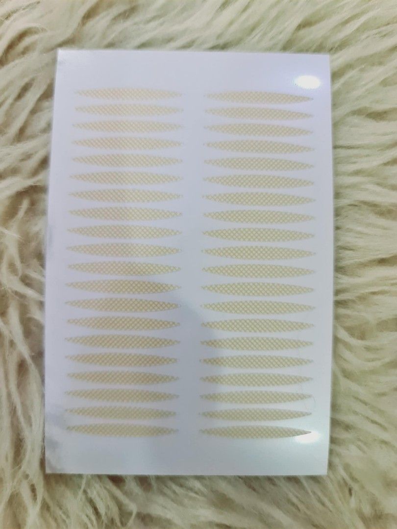 Eyelid tape (Category: Makeup) located in Quezon City. Submitted by floreskari78555 (Listing ID 1314358805, Image 2). Description: eyelid tape 3 designs available 20 php per pad.