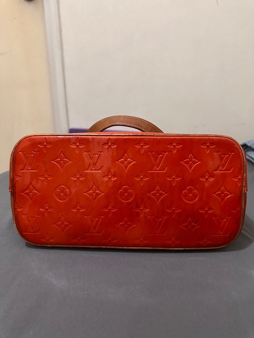 Louis Vuitton Red Monogram Vernis Houston Tote (Category: Luxury Bags & Wallets) located in Manila. Submitted by klowibaby (Listing ID 1314259946, Image 3). Description: Louis Vuitton Red Monogram Vernis Houston Tote. This tote features red patent leather with natural cowhide straps, a zip-top closure and red leather lining with zippered pocket and d-ring. The straps have a drop of 7” to top of bag. Measures 11.5” x 10” x 5.5”. Date Code/Authenti