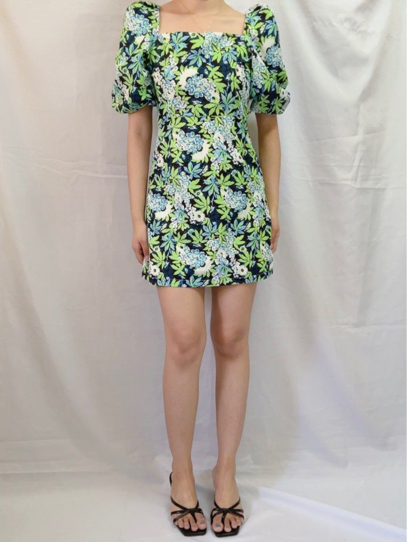 Multi-colored floral puffed sleeve dress (Category: Dresses) located in Manila. Submitted by reduxarchives (Listing ID 1314236057, Image 1). Description: Multi-colored floral puffed sleeve dress Small // W26” L30”.