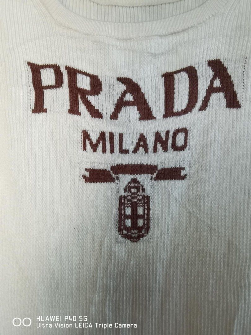 Prada knitted tanktop (Category: Luxury Apparel) located in Agoo. Submitted by omaethrift (Listing ID 1314192995, Image 2). Description: Issue Cut neck tag Needwash Fit small to medium Pag large pwede pa stretchy naman po.