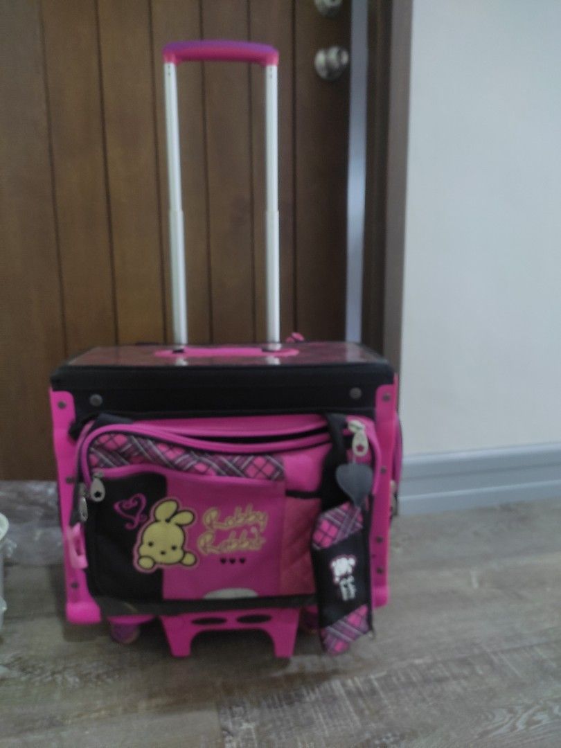 Robby Rabbit Big Trolley Bag (Category: Babies & Kids Fashion) located in Tarlac. Submitted by momma02 (Listing ID 1314247054, Image 2). Description: Used Robby Rabbit Trolley Bag for Girls 9/10 condition no flaws w signs of use last photo for price reference only payment first thru gcash🙂.
