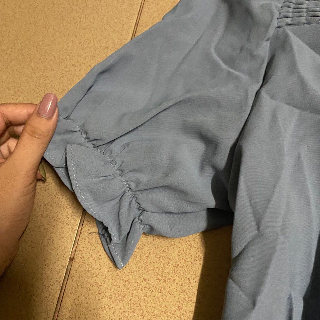 Ruffle top (Category: Blouses) located in Manila. Submitted by ranze (Listing ID 1314251672, Image 3). Description: Light blue aesthetic ruffle top. Perfect for dates, coffee dates. Stretchable in the back..