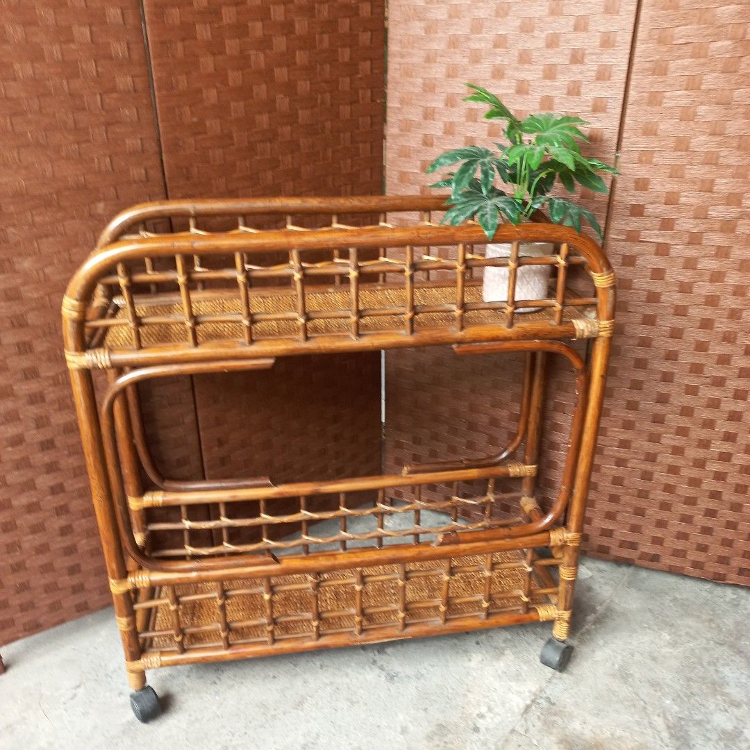 Vintage Large 2tier rattan multifunctional cart shelf plant rack boho farmhouse (Category: Other Home Furniture) located in Dasmarinas. Submitted by millennialmeetsvintage (Listing ID 1314203441, Image 1). Description: 2pcs available sold per piece H 87 x L 80 x W 25 cm sturdy and durable with 360° casters needs revarnishing fixed price 📌shipping via lalamove only 📌no reservations, first-to-pay basis 📌no physical store, no walk-ins 📌ships fro