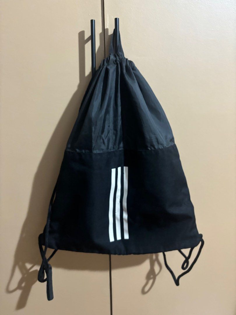 Adidas Black Drawstring Bag (Category: Backpacks) located in Marikina City. Submitted by elladeclutters_27 (Listing ID 1314437430, Image 2). Description: Barely used, issues are due to storage :(.