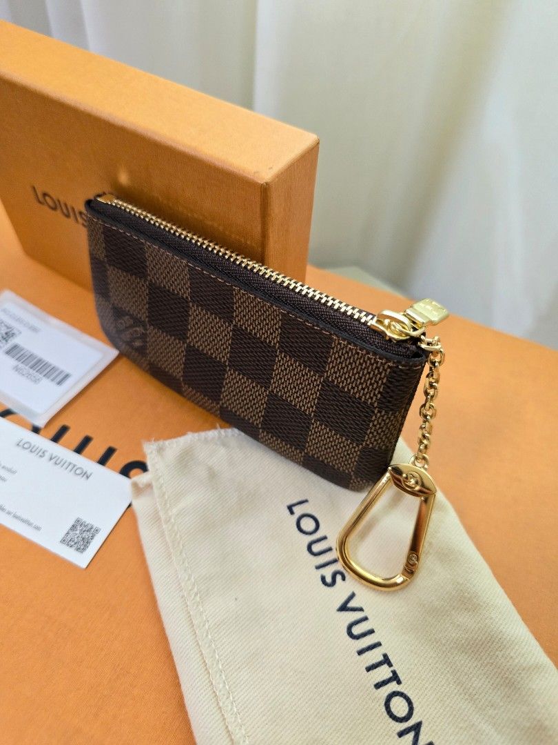 Brand New Louis Vuitton Key Cles Damier Ebene (Category: Luxury Bags & Wallets) located in Quezon City. Submitted by mademoisellegirl (Listing ID 1314538046, Image 2). Description: Brand New Louis Vuitton Key Cles in Damier Ebene comes with papers, dustbag and box perfectly fit your credit cards and other cards.