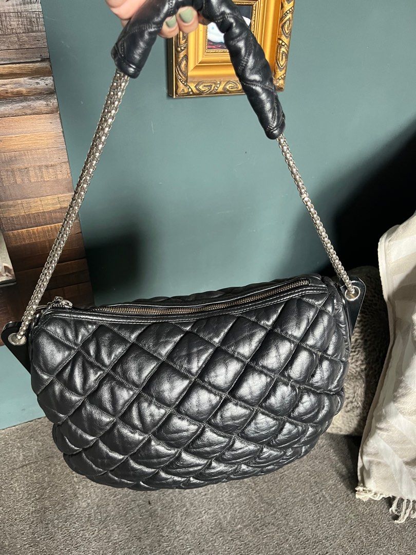 Chanel Bubble Hobo Bag (Category: Luxury Bags & Wallets) located in Antipolo. Submitted by rrraves (Listing ID 1314397243, Image 2). Description: Condition: Well used. Super soft leather. Leather smells good. Black, soft genuine leather with silver-tone metal accents. Lining in the usual Chanel jacquard logo with stamped logo zipper pull in interior pocket and a a tab with code. 17 x 14 inches This was a hand-me-down sent to me from the US. I hav