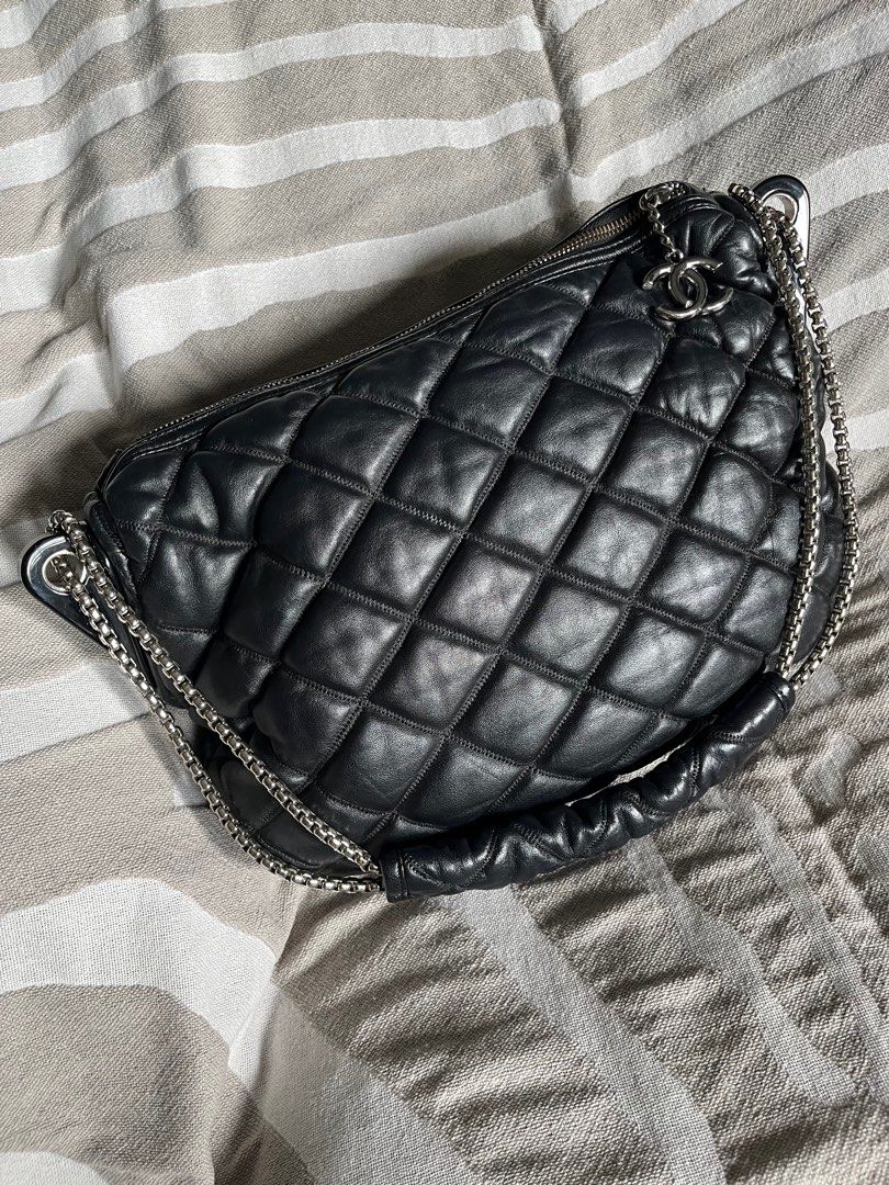 Chanel Bubble Hobo Bag (Category: Luxury Bags & Wallets) located in Antipolo. Submitted by rrraves (Listing ID 1314397243, Image 1). Description: Condition: Well used. Super soft leather. Leather smells good. Black, soft genuine leather with silver-tone metal accents. Lining in the usual Chanel jacquard logo with stamped logo zipper pull in interior pocket and a a tab with code. 17 x 14 inches This was a hand-me-down sent to me from the US. I hav