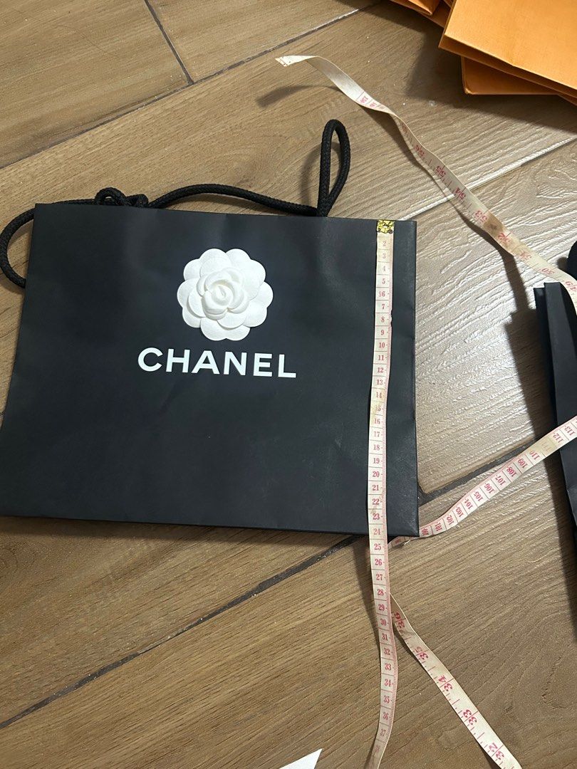 Chanel paperbag (Category: Luxury Accessories) located in Makati City. Submitted by bargainmnl (Listing ID 1314428199, Image 3). Description: With one(1) ribbon 🎀 .
