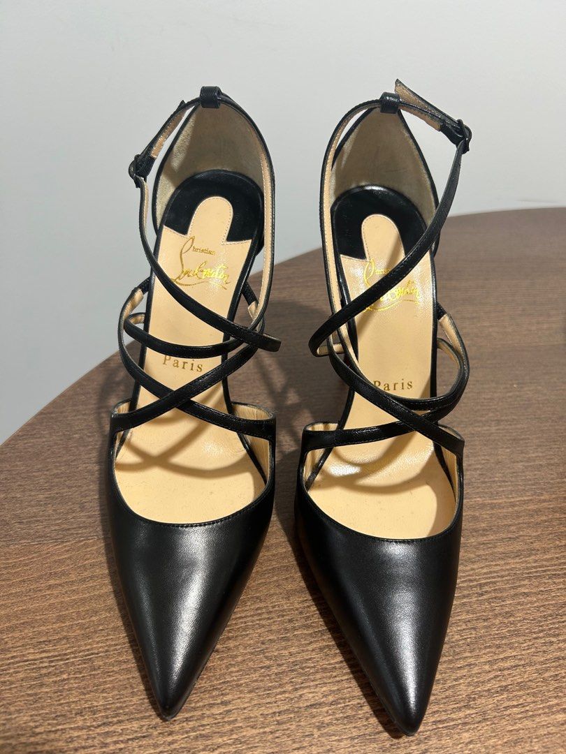 Christian Louboutin strap heels never worn