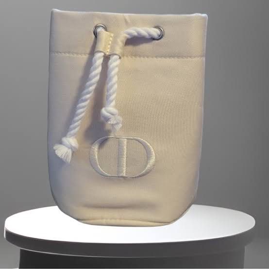 Dior beauty white drawstring cosmetic pouch mini organizer (Category: Luxury Bags & Wallets) located in Cainta. Submitted by adriannee (Listing ID 1314529685, Image 2). Description: Dior beauty gift with purchase, can be gifted to others, brand new - Authentic, with soft box only - Rfs decluttering and funds - Can fit iphone pro size and powerbank and more.