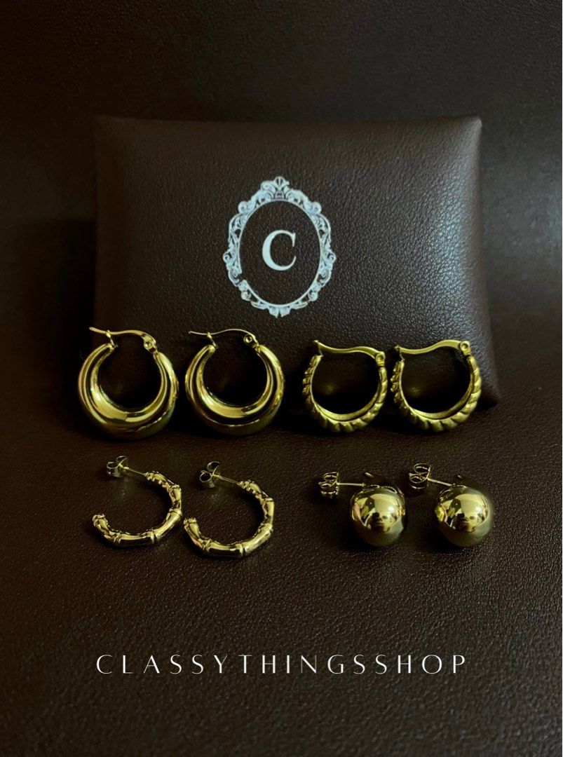 Gold Earrings Bundle of Four (Category: Earrings) located in Quezon City. Submitted by classythingsshop (Listing ID 1314485235, Image 1). Description: Gold Earrings Bundle of Four. Earrings Individual Prices • Chunky Gold Hoops: ₱750 • Croissant Hoops: ₱750 • Bamboo Hoops: ₱700 • Teardrop Earrings: ₱850 Total = ₱3,050 Bundle Price = ₱2,500 Actual photo of the items. Material: Stainless steel. All our items are high quality, nontarnish and hypoall