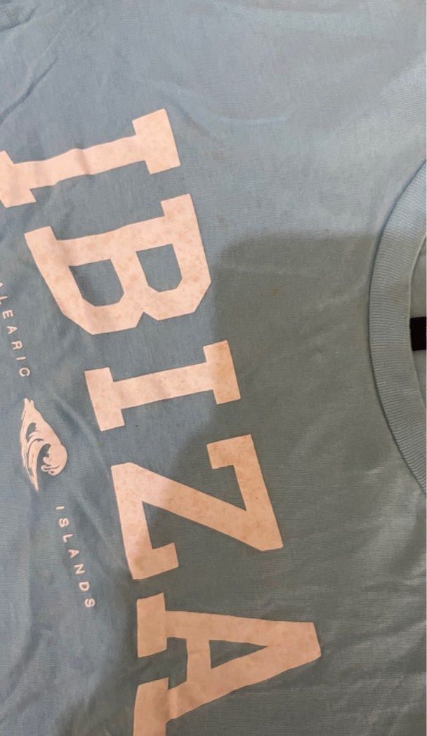 H M ibiza blue top