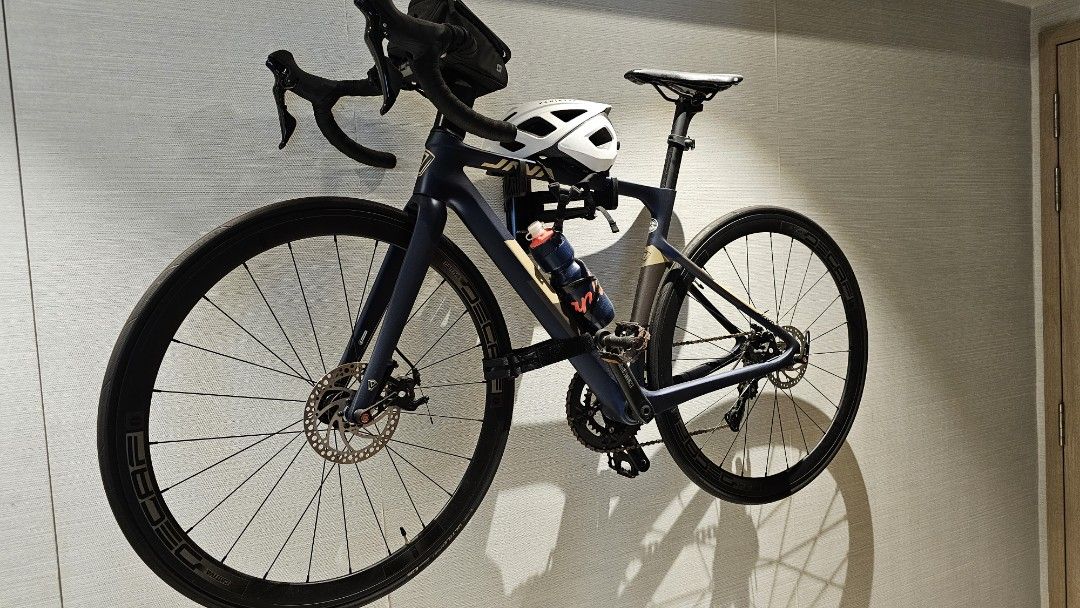 JAVA VESUVIO (s size) (Category: Bicycles) located in Singapore. Submitted by cozybear1 (Listing ID 1314369995, Image 1). Description: Java Vesuvio original condition. *Specifications Frame: UCI certified JAVA VESUVIO Disc Carbon T700 frame, flat mount disc brakes, full internal cable routing, aerodynamics Seatpost Weight: 9.9 Kg Fork: Carbon tapered, flat mount disc brakes DECAF integrated handlebar Shifters: Shimano 105 R7000 Front derailleur: 