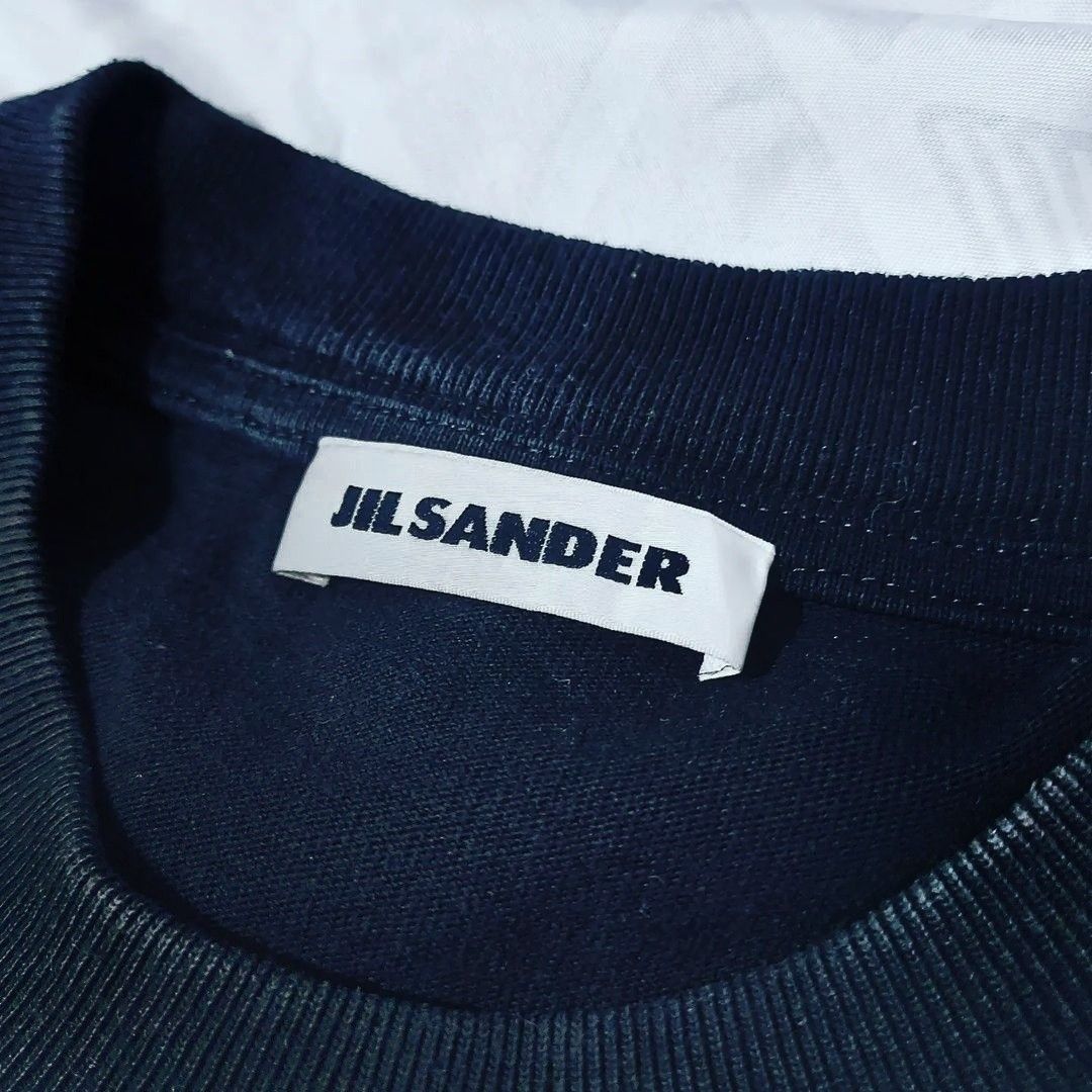 JIL SANDER (Category: Tshirts & Polo Shirts ) located in Manila. Submitted by corncube.collective (Listing ID 1314529985, Image 3). Description: JIL SANDER (AUTHENTIC) Medium on tag Complete Tags 9.5/10 Condition Makapal yung tela No ISSUE #jilsander #thriftph #thrift #thriftstorefinds #jilsander.