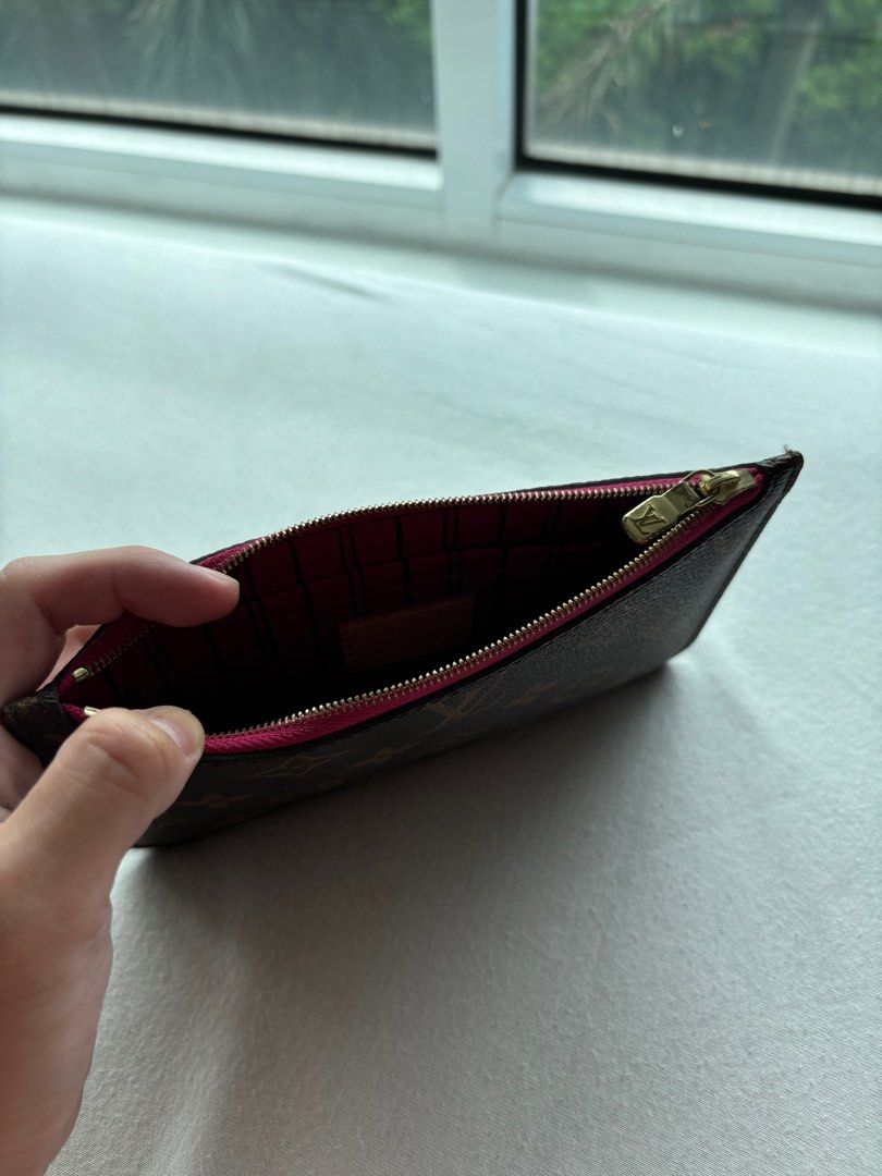 Louis Vuitton Neverfull zip pouch (Category: Luxury Bags & Wallets) located in Pasig City. Submitted by angelcstlln (Listing ID 1314420504, Image 3). Description: Decluttering, priced low for a quick sale. Original Louis Vuitton Neverfull PM zip pouch. Lightly used. Pink interior (actual photos provided). .
