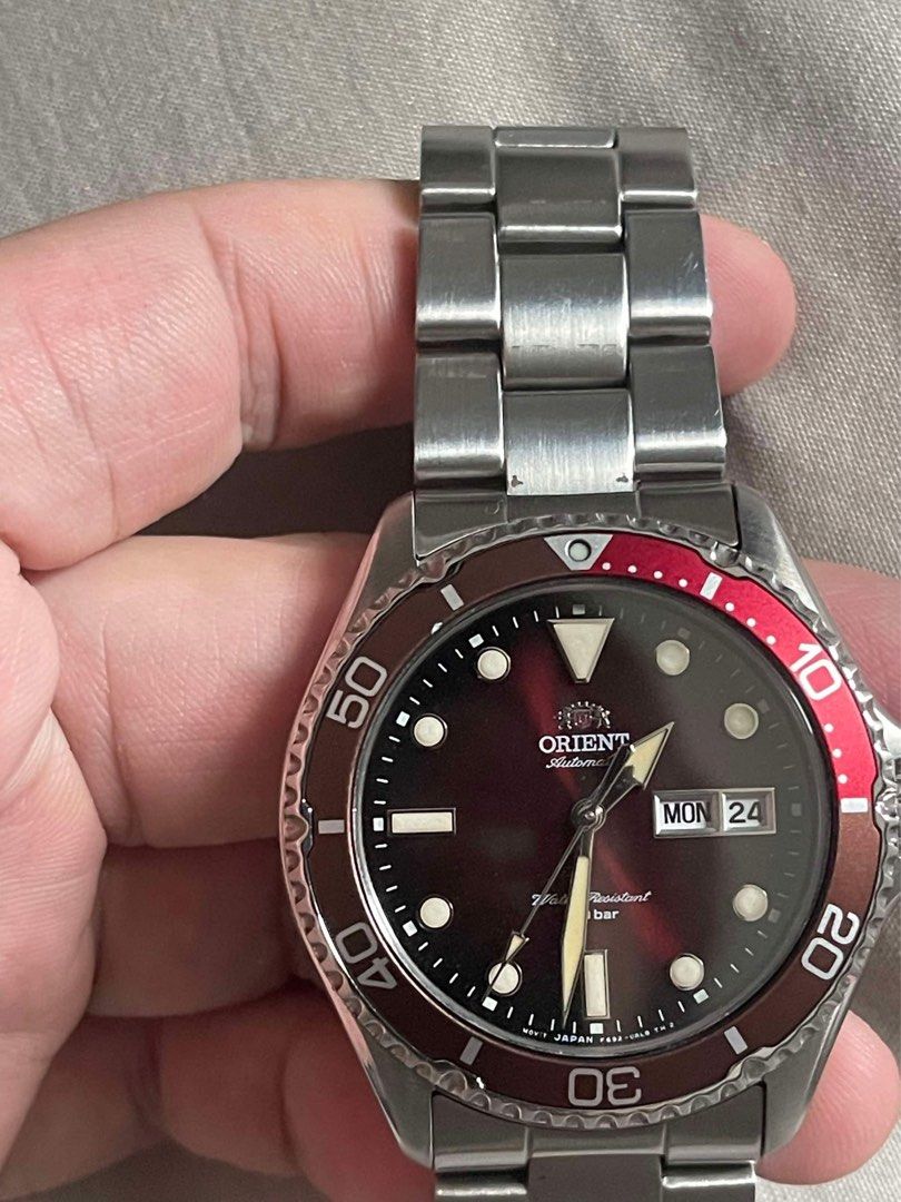 Orient Kamasu 2 Red (RA-AA0814R) Divers Watch (Category: Men's Watches) located in Mandaluyong City. Submitted by shoti___go (Listing ID 1314528512, Image 2). Description: Orient Kamasu 2 Red (RA-AA0814R) Divers Watch - 20 bar water resist (200m) - Sapphire Crystal - Unidirectional Bezel - Screwdown crown Used, with 1 scratch on the bezel and some scratches on the bracelet Complete with box and all papers watchlinks etc Meetups only at Mandaluyon