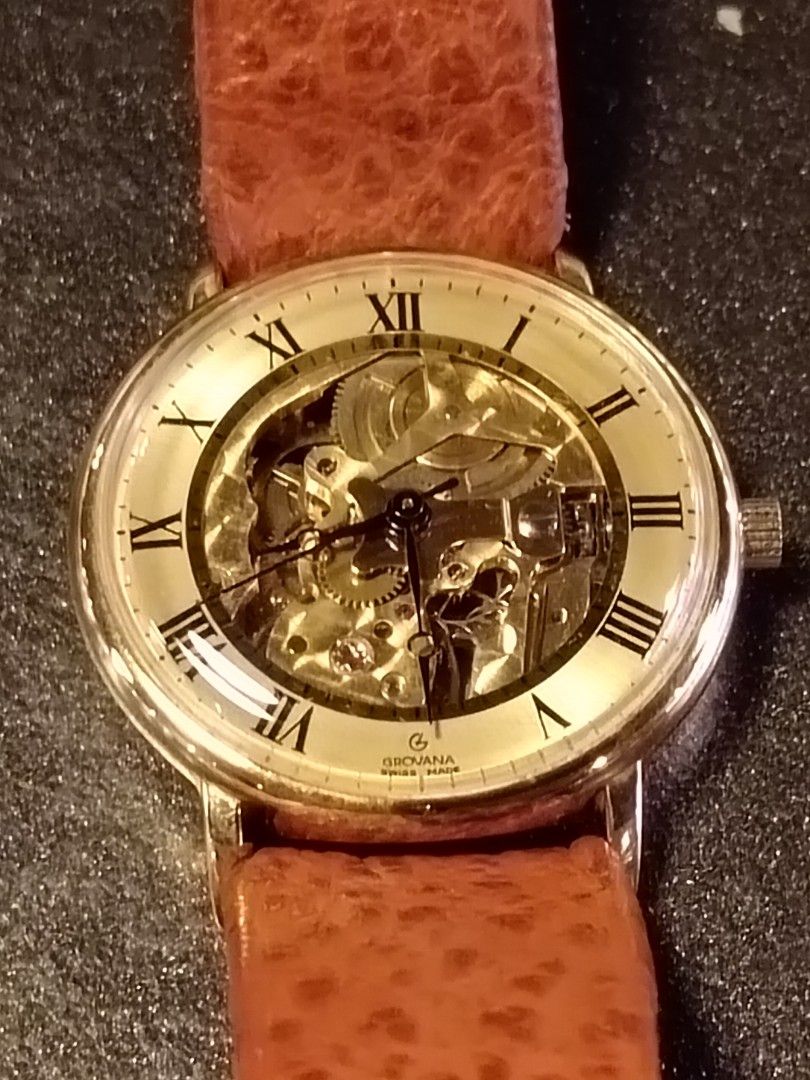 Swiss made skeleton watch clearance